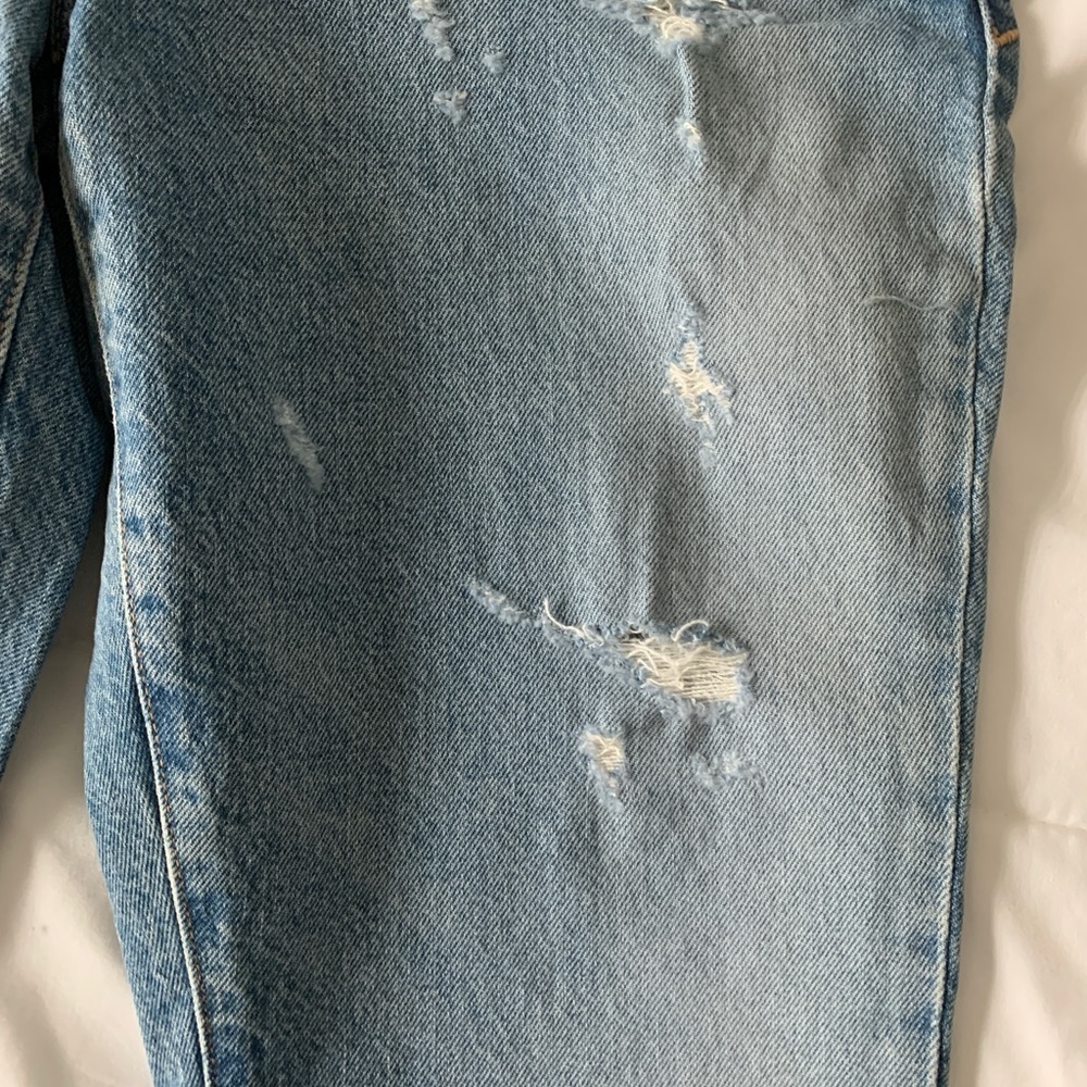 Good American Good Classic Distressed Hi-Rise Jeans - Picture 8 of 10